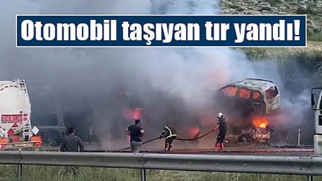 Otomobil taşıyan tır yandı