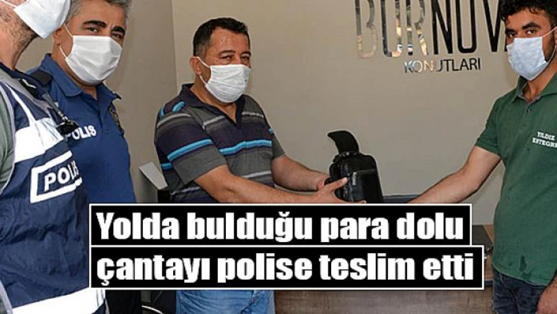 Yolda bulduğu para dolu çantayı polise teslim etti