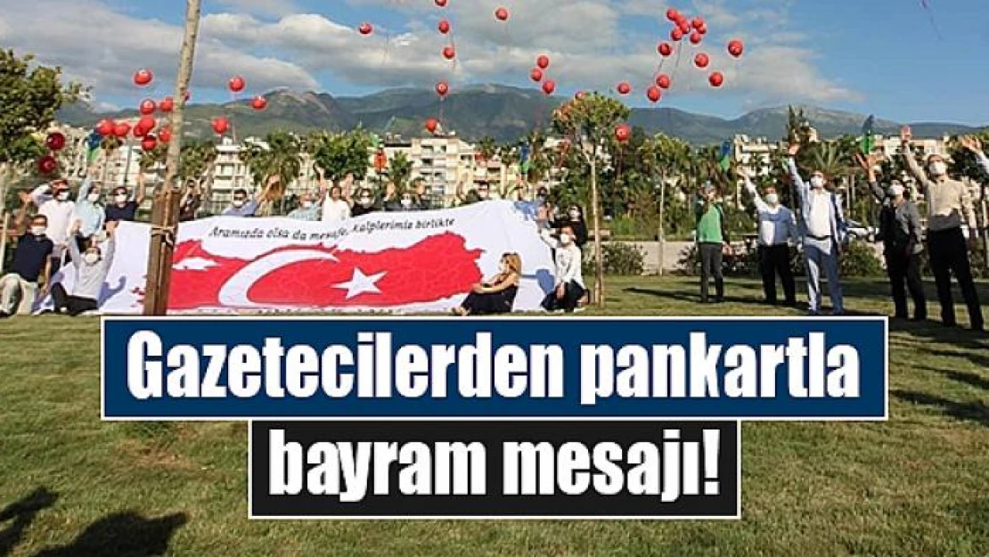 Gazetecilerden pankartla bayram mesajı