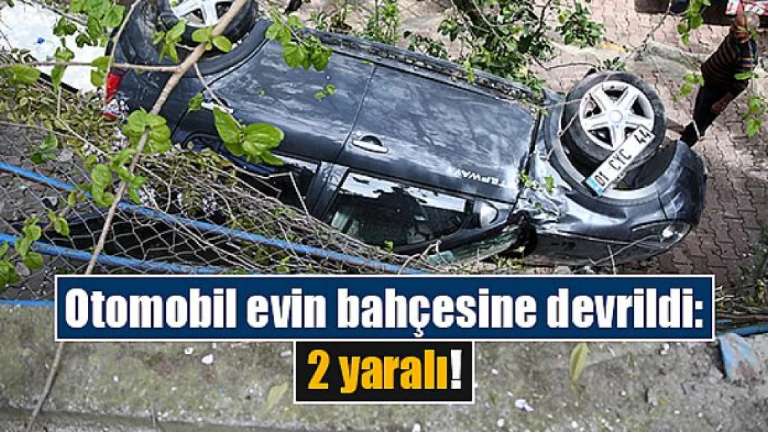 Otomobil evin bahçesine devrildi: 2 yaralı!