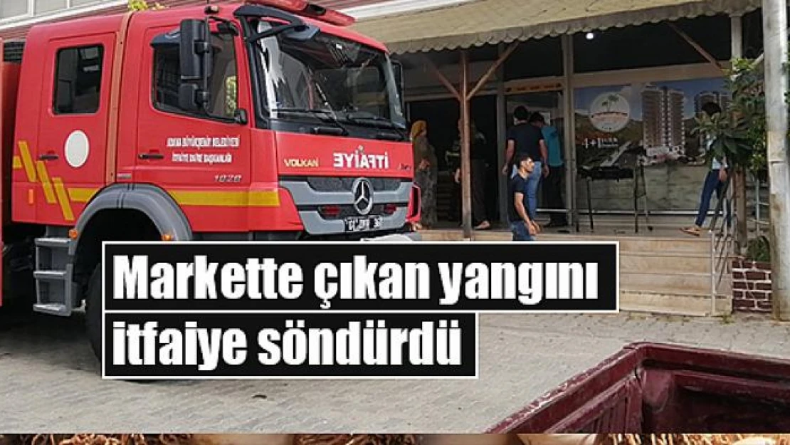 Markette çıkan yangını itfaiye söndürdü