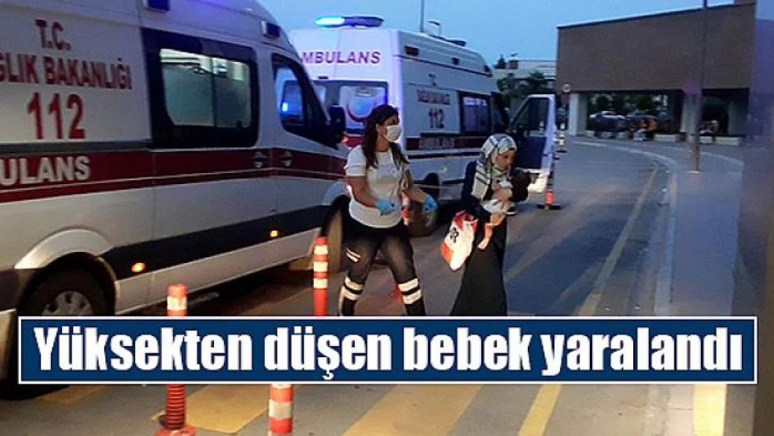 Yüksekten düşen bebek yaralandı