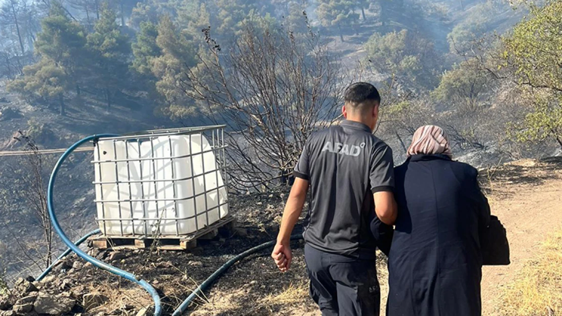 Orman yangınında mahsur kalan 2 kişiyi AFAD kurtardı