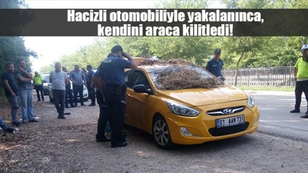 Hacizli otomobiliyle yakalanınca, kendini araca kilitledi!