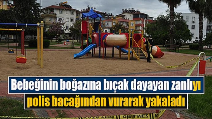 Bebeğinin boğazına bıçak dayayan zanlıyı polis bacağından vurarak yakaladı
