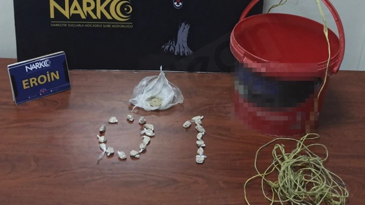 Evden sarkıttığı kovayla uyuşturucu satan zanlı tutuklandı